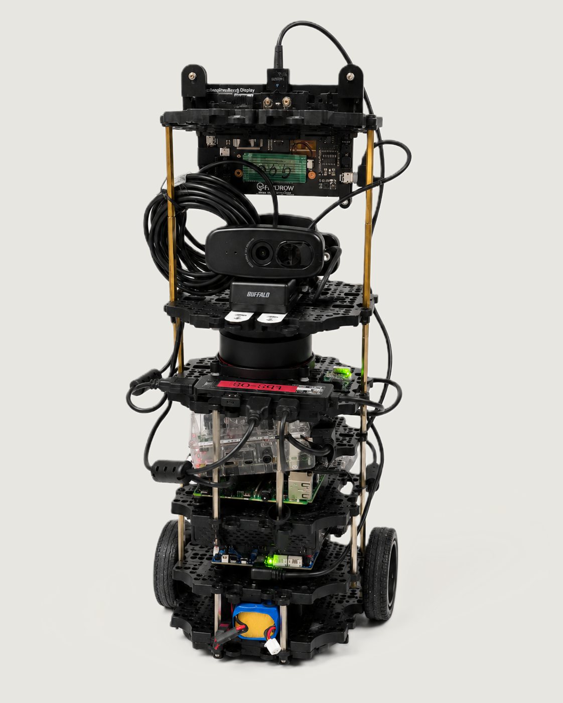 TurtleBot3 stack: expression screen up top, front USB camera for crosswalk/traffic-light vision, LiDAR puck, and a Raspberry Pi tier driving everything below.